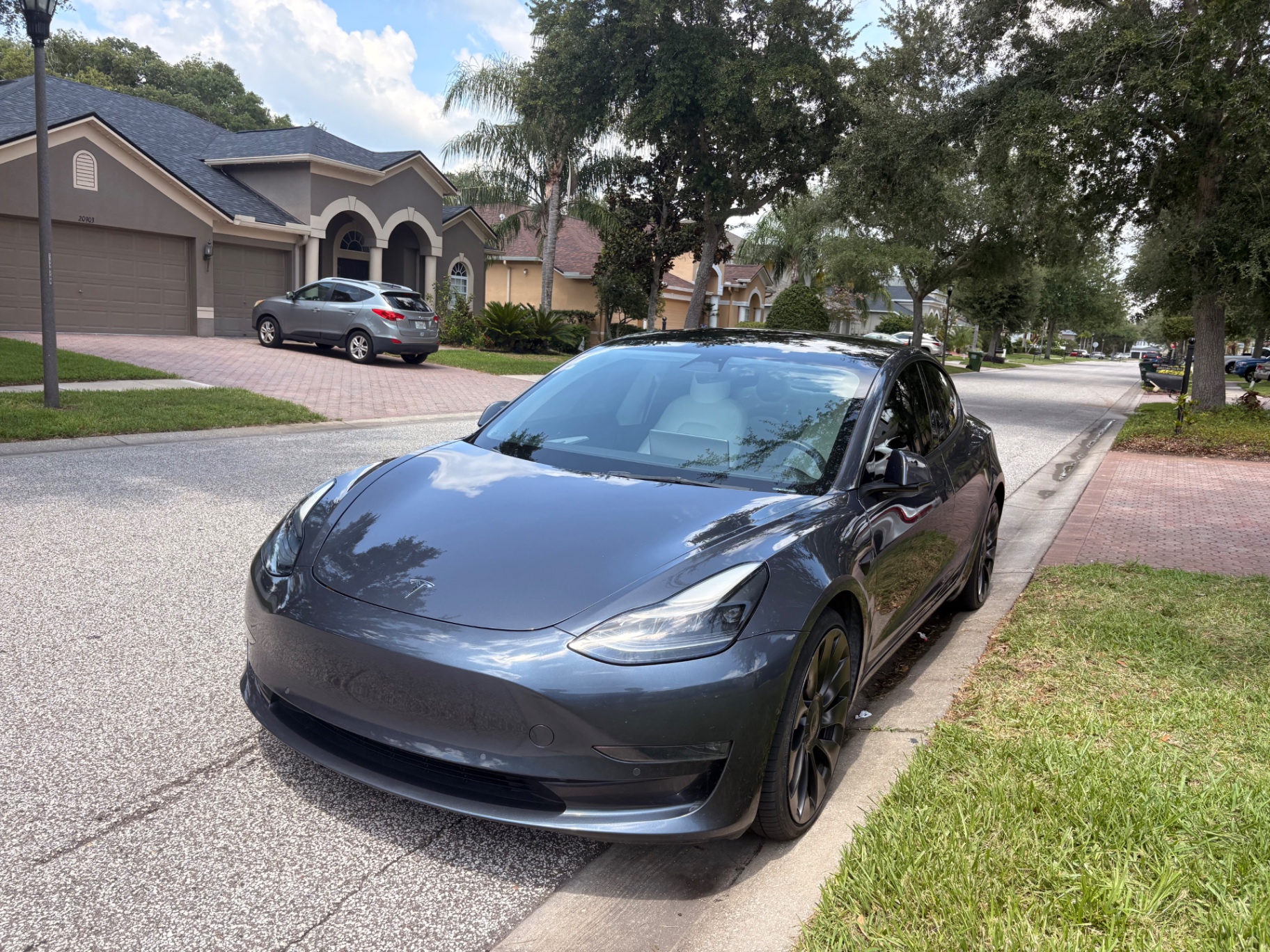Freshly detailed dark gray Tesla